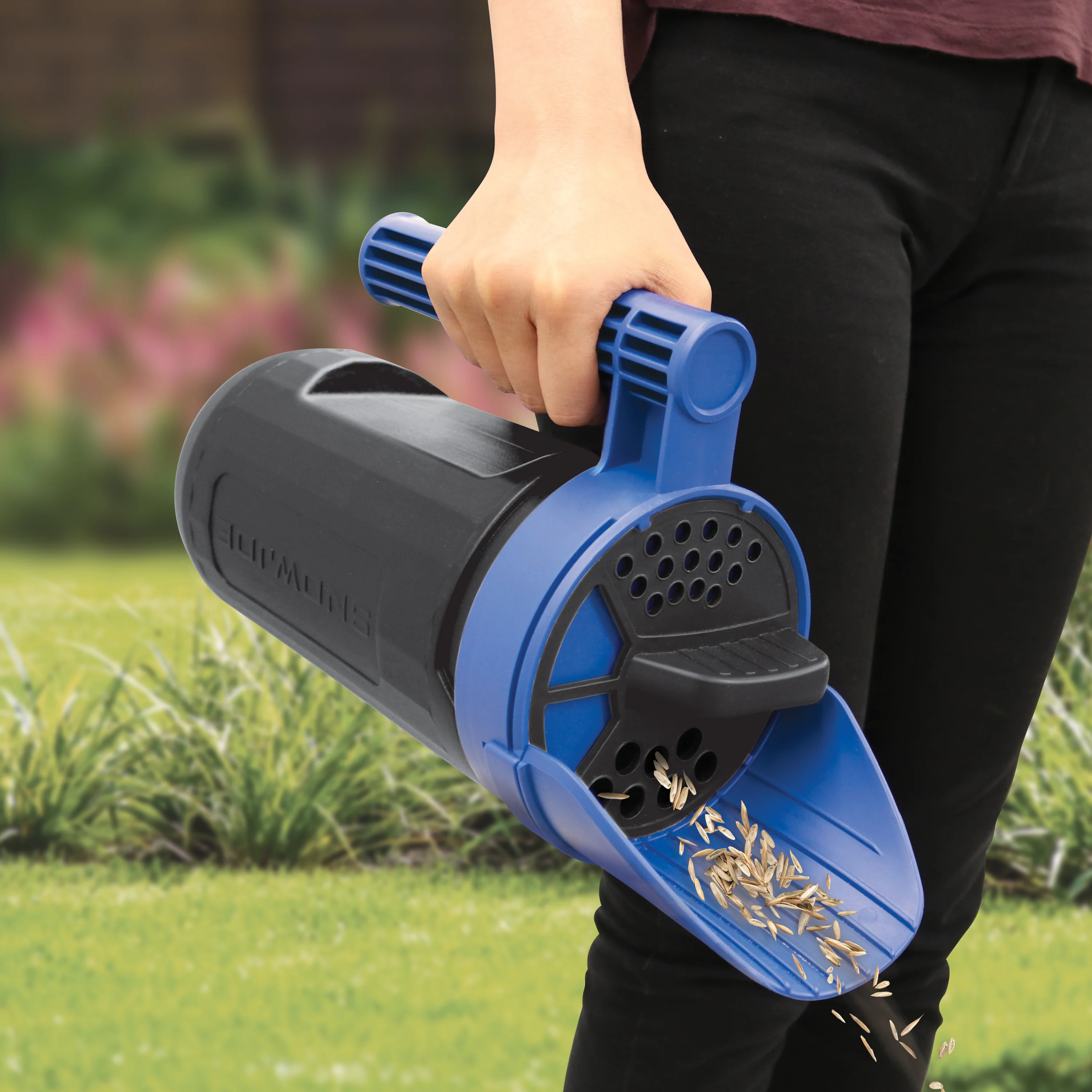 Snow Joe + Sun Joe Handheld All-Season Multi-Purpose Spreader | 5 lbs | W/ Adjustable Dial Flow Control - Image 9