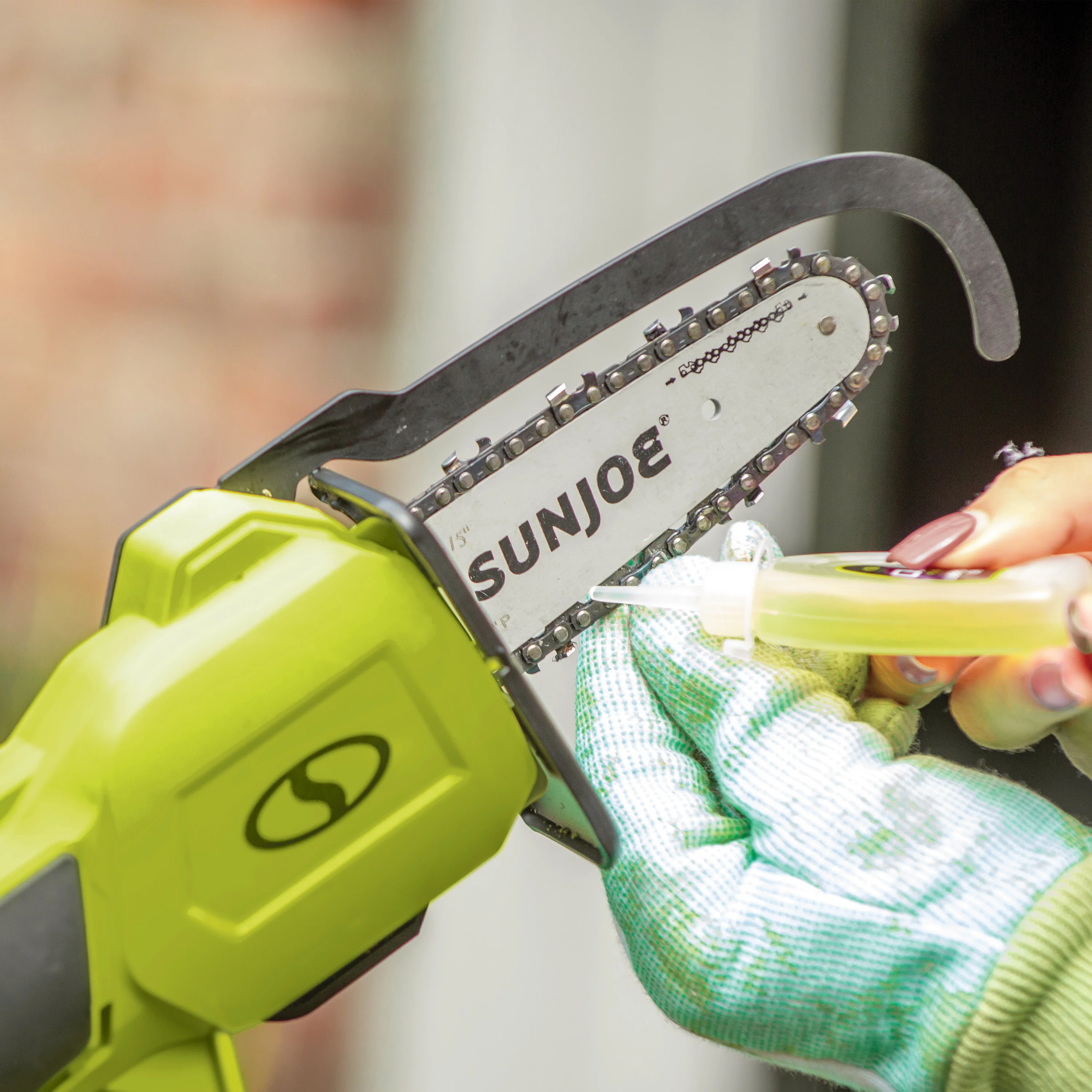 Sun Joe 24V-HCSEC-LT 24-Volt* IONMAX Cordless Handheld Chainsaw | 5-inch Pruning Saw Kit | W/ 2.5-Ah Battery, Charger, and Bonus Chain - Image 11